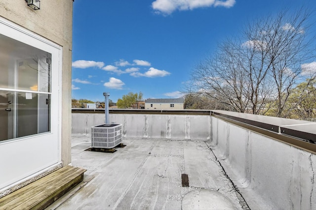 5350 N Damen Ave Unit F, Chicago, IL 60625 - view of patio featuring central AC and a balcony