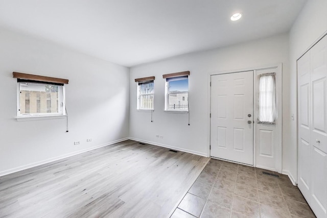 5350 N Damen Ave Unit F, Chicago, IL 60625 - entrance foyer with recessed lighting, baseboards, visible vents, and light wood-type flooring