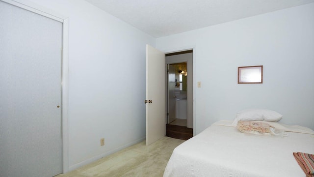 bedroom featuring light colored carpet