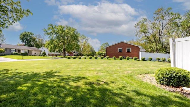 view of yard featuring fence