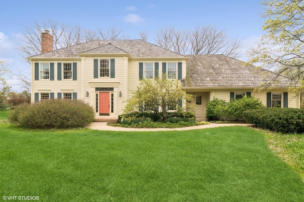 21181 W Yorkshire Dr, Kildeer, IL 60047 - colonial-style house featuring a front yard and a chimney