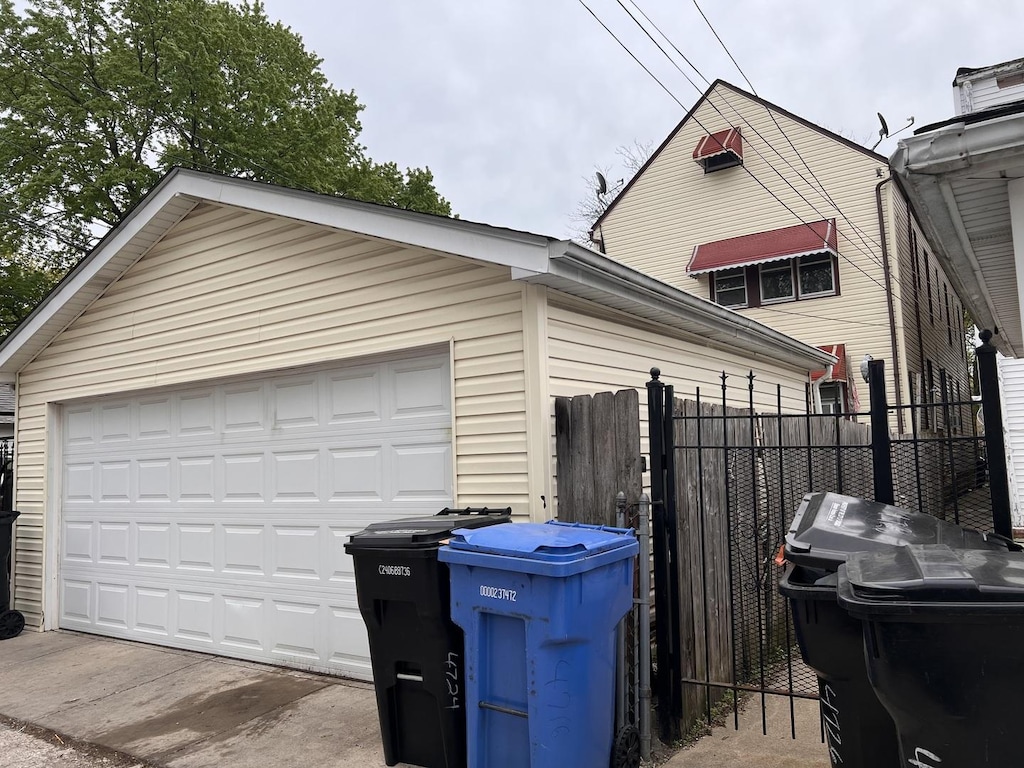 detached garage with fence