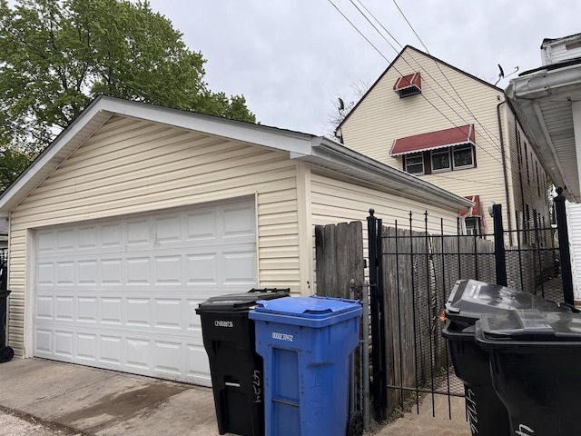 detached garage with fence