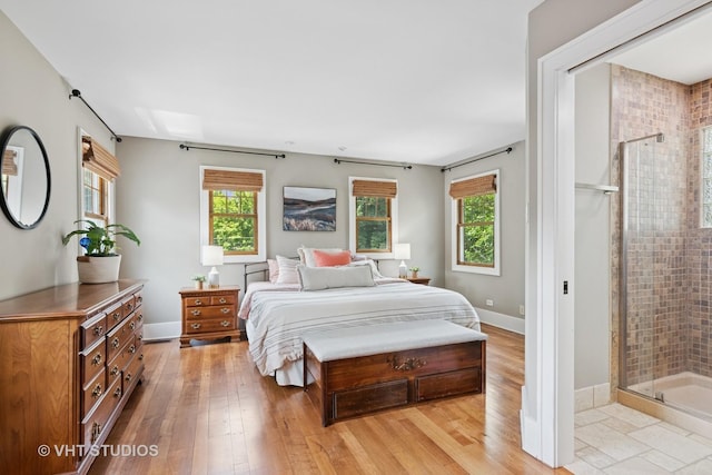 122 Logan Ave, Geneva, IL 60134 - bedroom with light wood-type flooring and baseboards