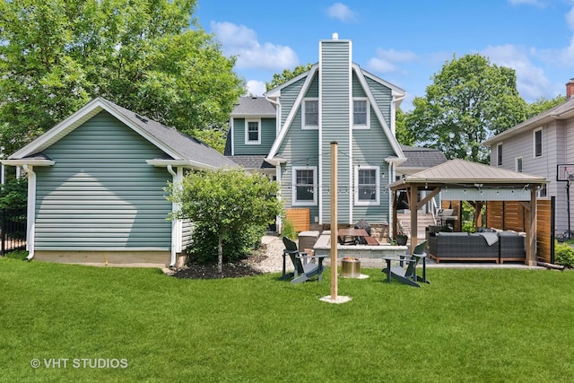 122 Logan Ave, Geneva, IL 60134 - rear view of property featuring an outdoor living space, a gazebo, a chimney, a patio, and roof with shingles