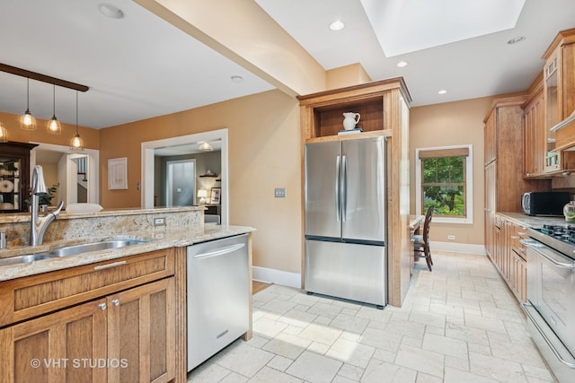 122 Logan Ave, Geneva, IL 60134 - kitchen featuring appliances with stainless steel finishes, stone tile floors, brown cabinetry, light stone countertops, and recessed lighting