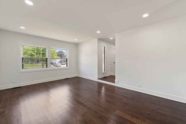 1100 Leicester Rd, Elk Grove Village, IL 60007 - spare room with recessed lighting and dark wood-style floors