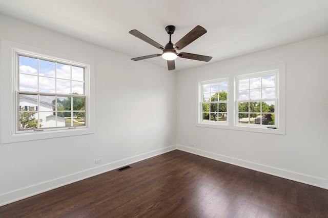1100 Leicester Rd, Elk Grove Village, IL 60007 - unfurnished room with dark wood-style floors and ceiling fan