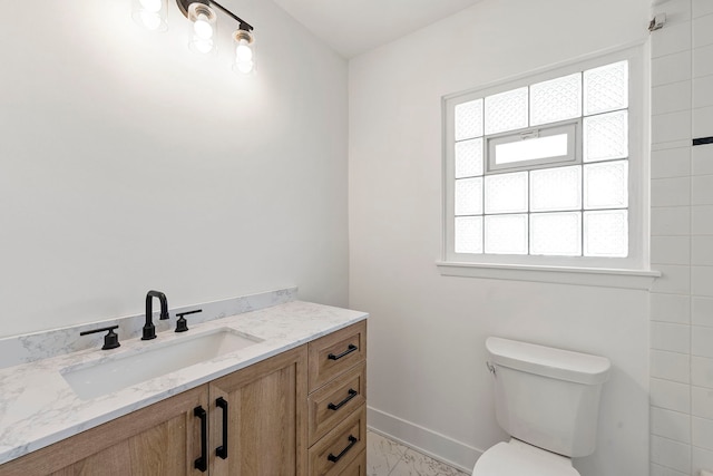 1100 Leicester Rd, Elk Grove Village, IL 60007 - bathroom featuring marble finish flooring and vanity
