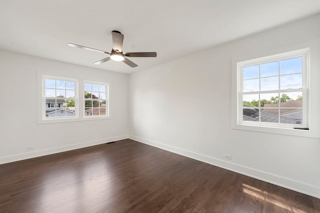 1100 Leicester Rd, Elk Grove Village, IL 60007 - spare room featuring dark wood-style floors and a ceiling fan