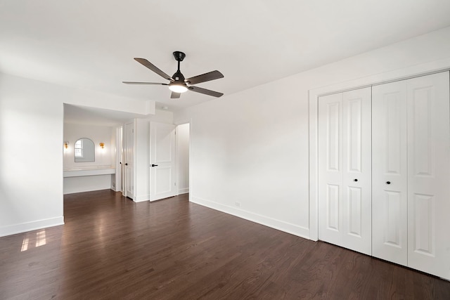 1100 Leicester Rd, Elk Grove Village, IL 60007 - unfurnished bedroom with dark wood finished floors, a closet, and ceiling fan