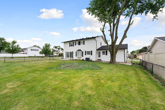 1100 Leicester Rd, Elk Grove Village, IL 60007 - rear view of house with a fenced backyard and entry steps