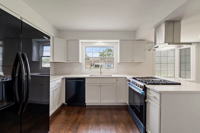 1100 Leicester Rd, Elk Grove Village, IL 60007 - kitchen featuring black appliances, dark wood-style flooring, light countertops, and decorative backsplash