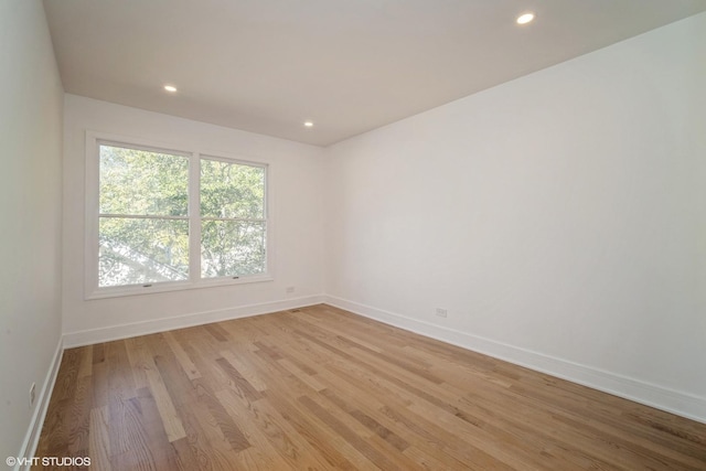 823 Suffield Sq, Lincolnshire, IL 60069 - spare room featuring recessed lighting, baseboards, and light wood-type flooring