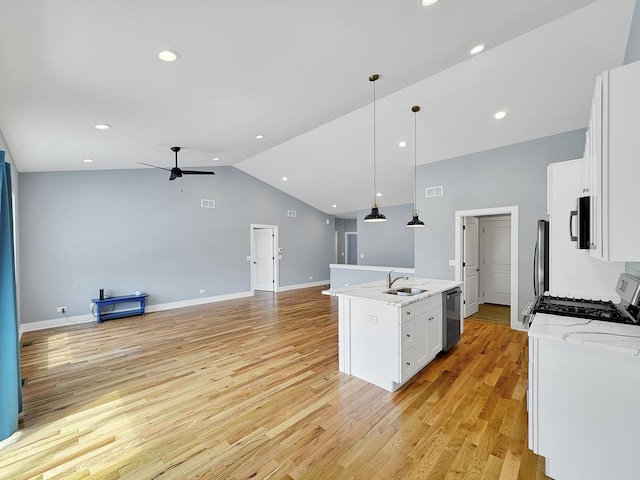 946 Partridge Cir, Marengo, IL 60152 - kitchen featuring open floor plan, ceiling fan, a kitchen island with sink, and stainless steel appliances