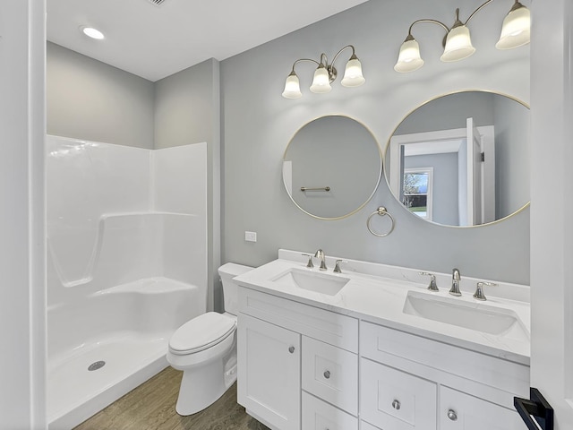 946 Partridge Cir, Marengo, IL 60152 - full bath featuring a sink, a shower, toilet, and double vanity