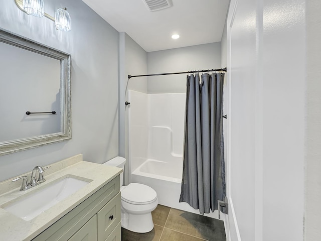 946 Partridge Cir, Marengo, IL 60152 - full bathroom with visible vents, vanity, tile patterned floors, toilet, and shower / tub combo with curtain