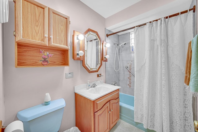 bathroom with vanity, tile patterned floors, toilet, and shower / tub combo with curtain