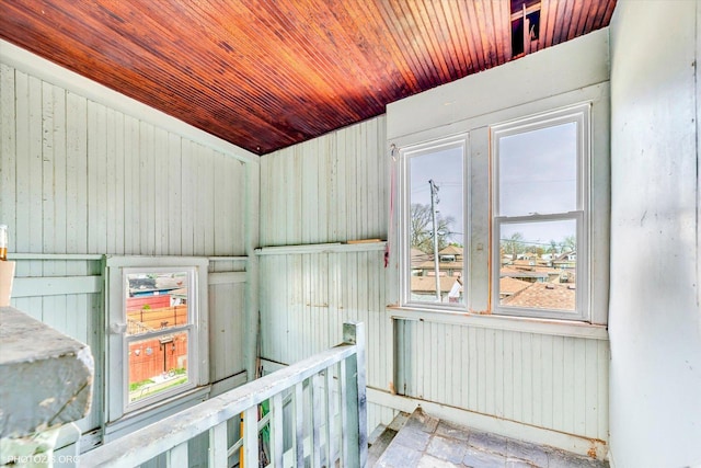 interior space with wood ceiling