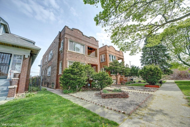 exterior space featuring brick siding