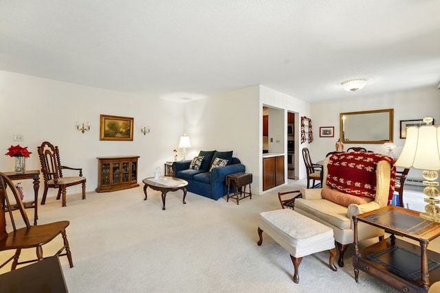living room featuring light colored carpet