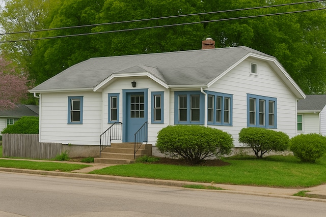 1602 Price St, Rockford, IL 61103 - single story home with entry steps, a chimney, and a front lawn