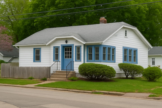 1602 Price St, Rockford, IL 61103 - ranch-style home featuring a chimney and entry steps