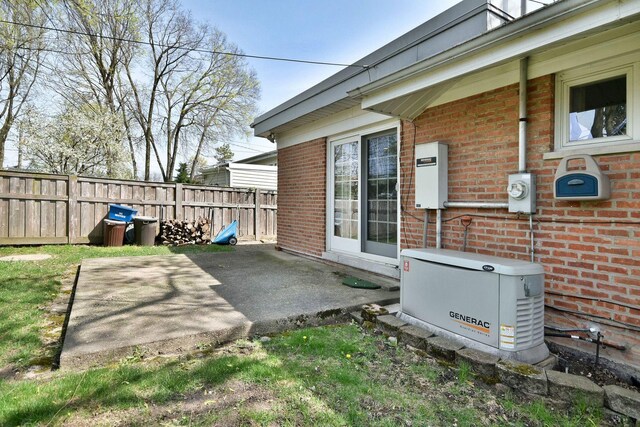 view of patio featuring fence