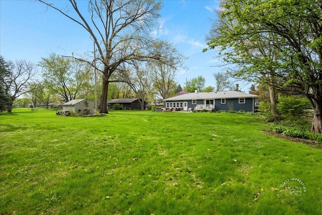view of yard featuring a deck