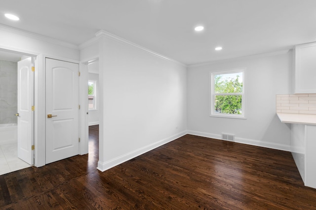 9048 Oneill Dr, Burr Ridge, IL 60527 - interior space with crown molding, baseboards, visible vents, and wood finished floors