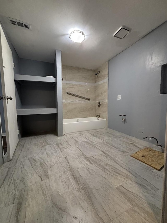 full bath with visible vents and tub / shower combination