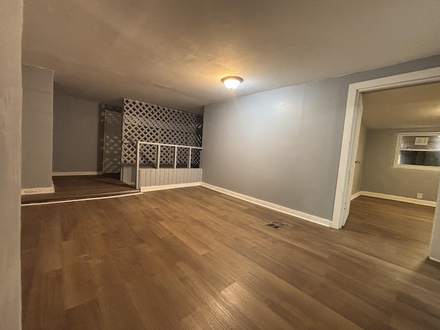 2342 W 72nd St, Chicago, IL 60636 - spare room featuring baseboards and wood finished floors