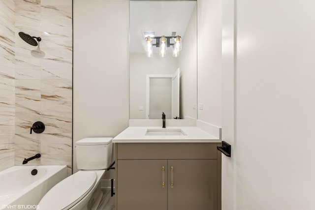 full bath featuring toilet, shower / washtub combination, and vanity