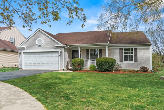 14 Mckinley Ln, Streamwood, IL 60107 - view of front of property with a porch, an attached garage, a front yard, and aphalt driveway