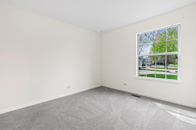 14 Mckinley Ln, Streamwood, IL 60107 - carpeted empty room featuring baseboards and visible vents