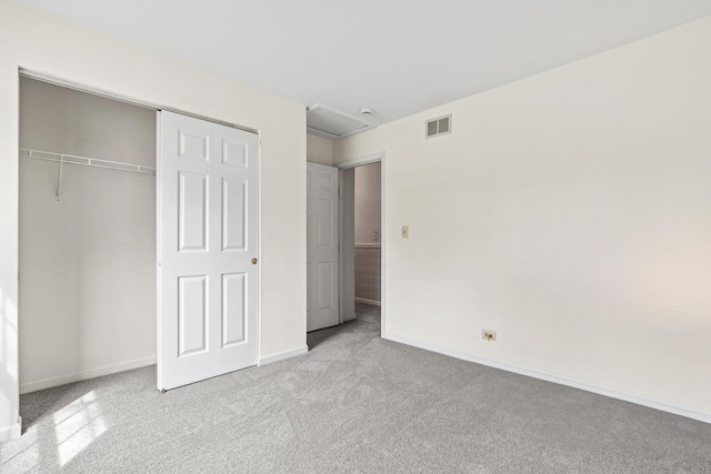 14 Mckinley Ln, Streamwood, IL 60107 - unfurnished bedroom featuring visible vents, carpet, baseboards, and a closet