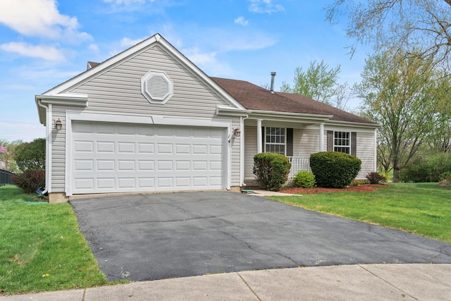 14 Mckinley Ln, Streamwood, IL 60107 - view of front of property featuring a garage, covered porch, a front lawn, and aphalt driveway