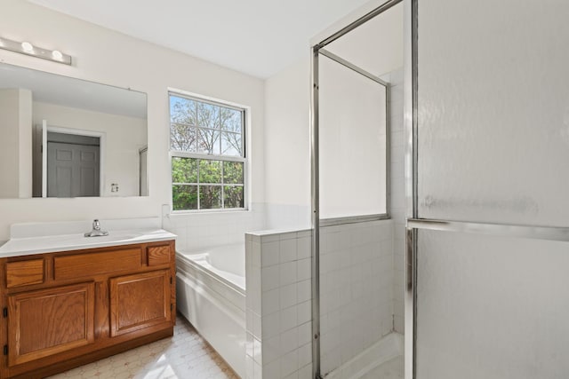 14 Mckinley Ln, Streamwood, IL 60107 - bathroom with vanity, a garden tub, and a shower stall