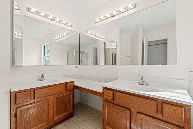 14 Mckinley Ln, Streamwood, IL 60107 - full bathroom featuring vanity and tile patterned floors