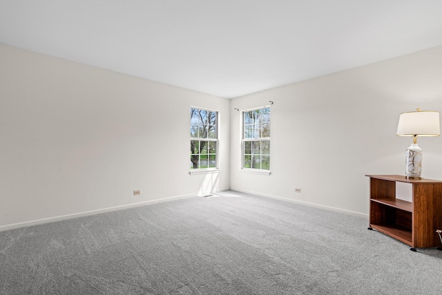 14 Mckinley Ln, Streamwood, IL 60107 - carpeted empty room featuring baseboards