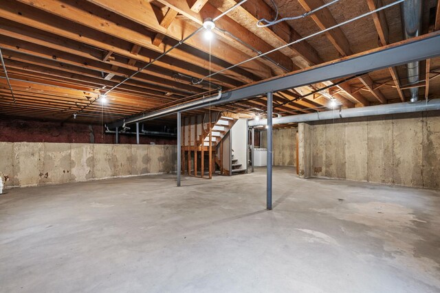 14 Mckinley Ln, Streamwood, IL 60107 - unfinished basement with stairs and washer / clothes dryer