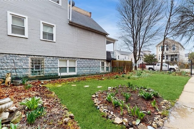 view of yard with fence