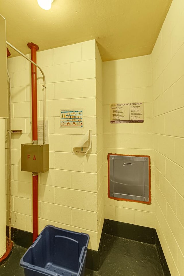 2901 S Michigan Ave Unit 1702, Chicago, IL 60616 - bathroom featuring a shower and concrete block wall