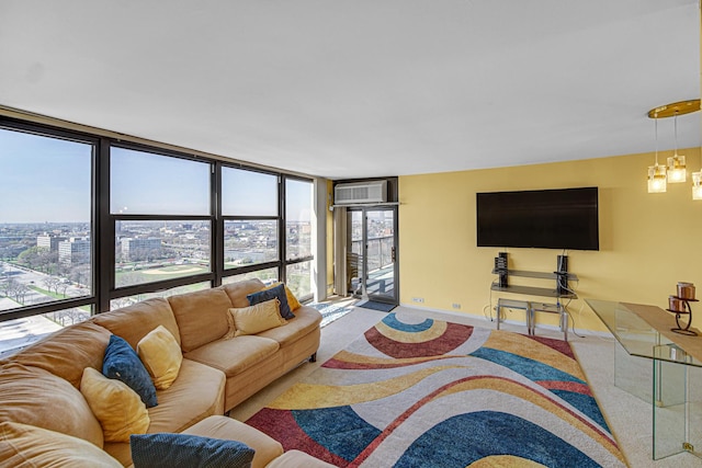2901 S Michigan Ave Unit 1702, Chicago, IL 60616 - carpeted living area featuring baseboards, a wall mounted air conditioner, and a wall of windows