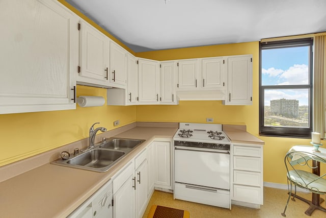 2901 S Michigan Ave Unit 1702, Chicago, IL 60616 - kitchen featuring a sink, light countertops, under cabinet range hood, white cabinets, and white gas range oven
