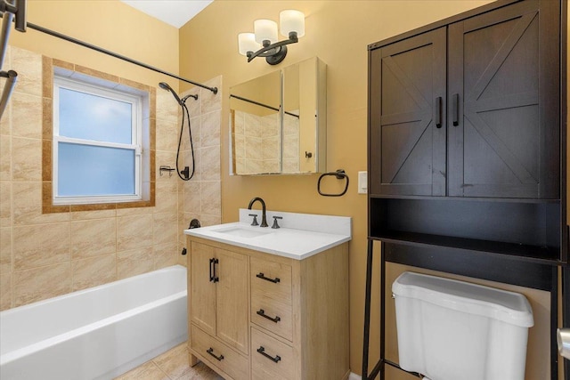full bath featuring vanity, shower / bathing tub combination, tile patterned flooring, and toilet