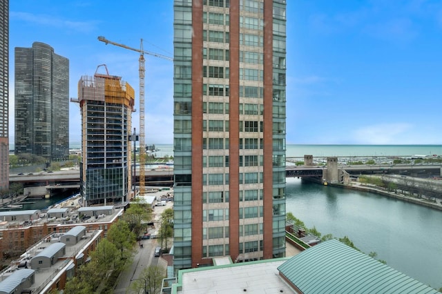 property's view of city featuring a water view