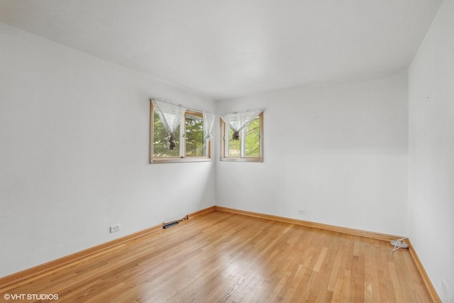 116 E Armitage Ave, Addison, IL 60101 - empty room with wood-type flooring and baseboards
