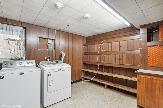 116 E Armitage Ave, Addison, IL 60101 - laundry area with cabinet space, separate washer and dryer, and wood walls
