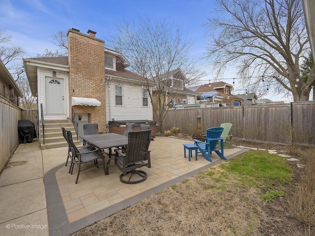 view of patio / terrace with a fenced backyard and entry steps